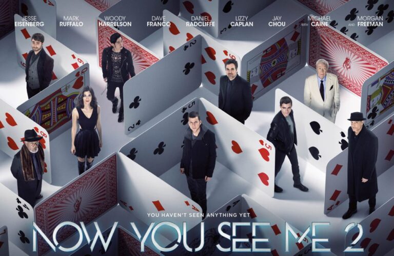 Promotional poster for Now You See Me 2, featuring the main cast including Jesse Eisenberg, Mark Ruffalo, Woody Harrelson, Dave Franco, Daniel Radcliffe, Lizzy Caplan, Jay Chou, Michael Caine, and Morgan Freeman, positioned within an intricate maze of oversized playing cards, conveying the film's magic and illusion theme.