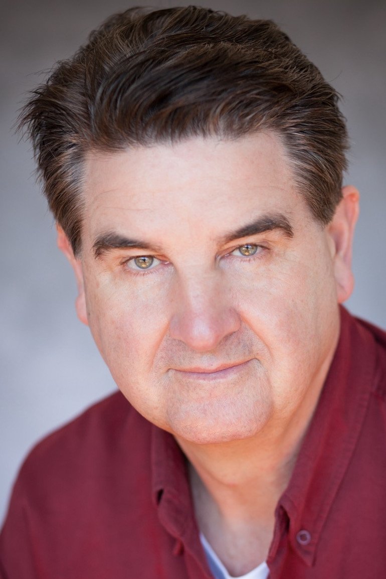 A headshot of Mark Wright.