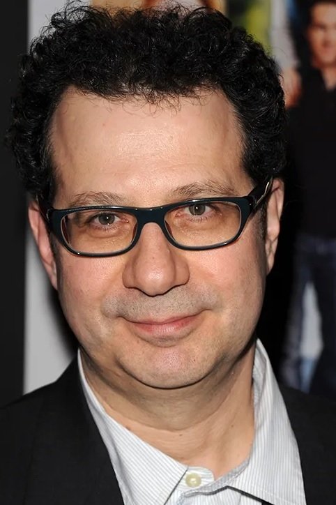 A headshot of Adam Brooks.