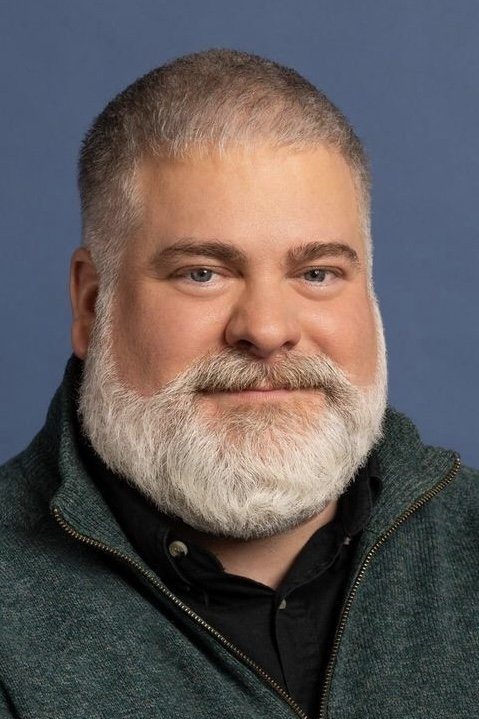 A headshot of Dean DeBlois.