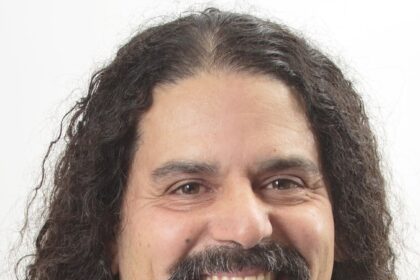 A headshot of Hiram Garcia.