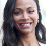 A headshot of Zoe Saldaña.