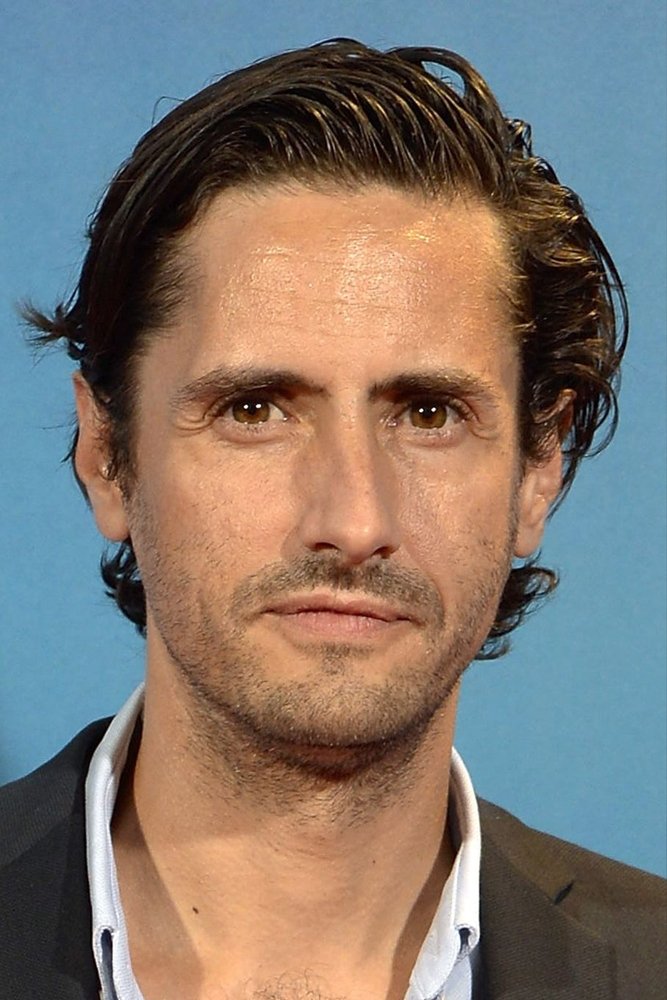 Official headshot photo of person: Juan Diego Botto.